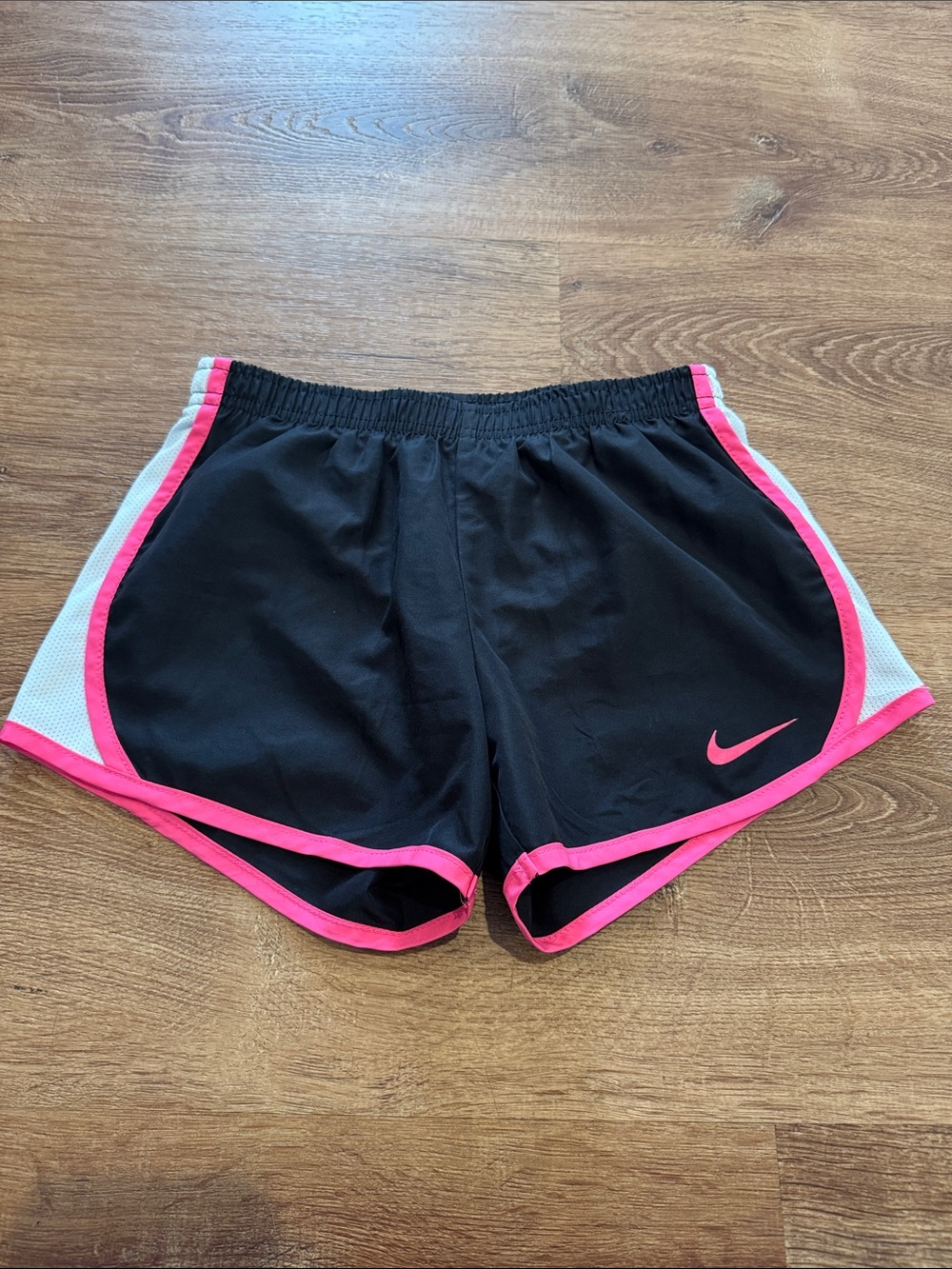 Nike girls Black Athletic Shorts with Pink Trim (6-7)